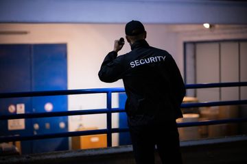Security guard patrolling a building